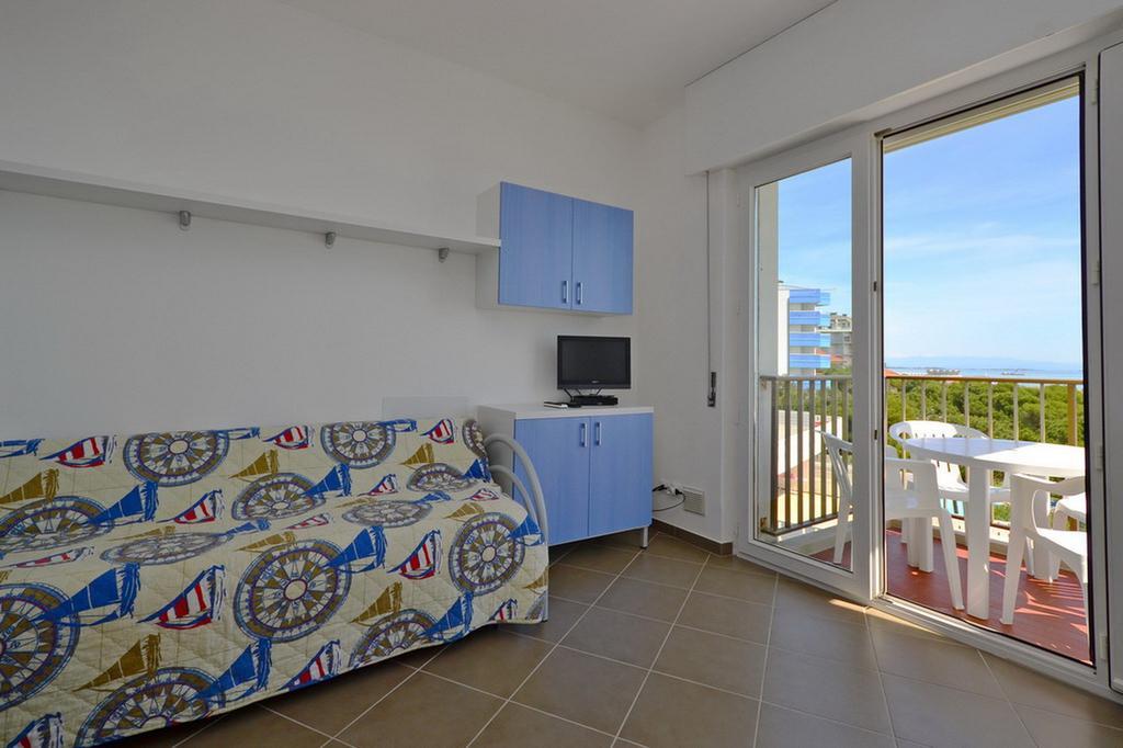 International Seaview Apartments Lignano Sabbiadoro Quarto foto